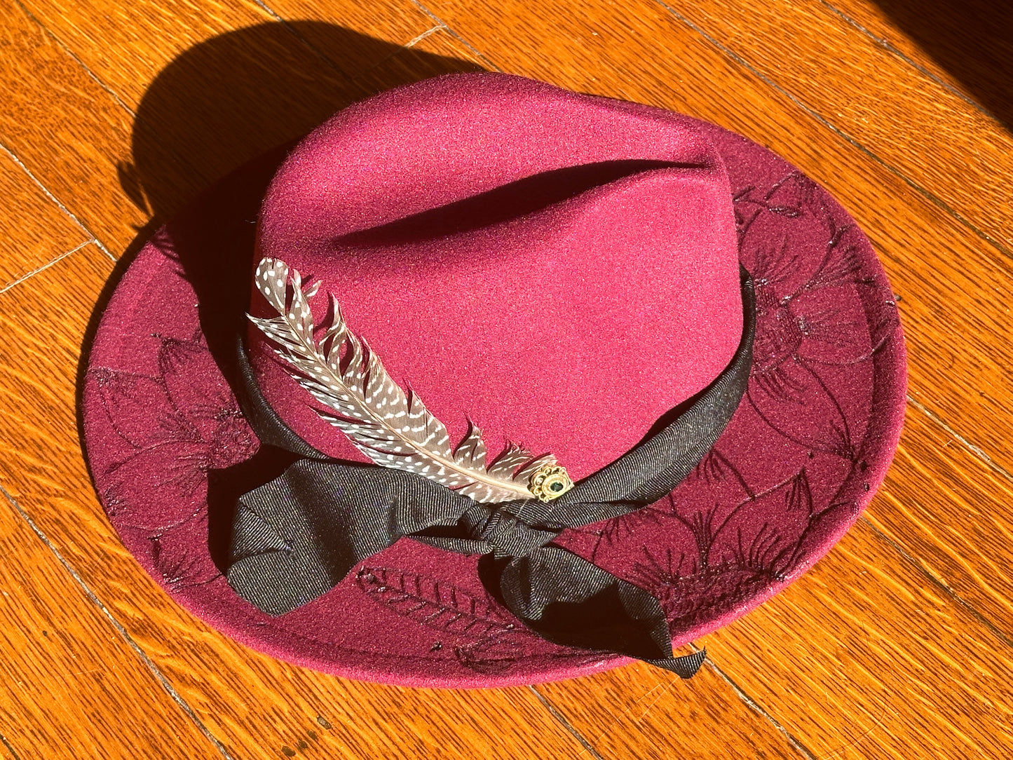 Burgundy Fedora Style Hat with Burned Flowers and Feather by Kathy Fazio