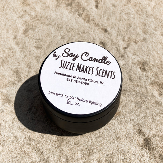 Soy Candle in a black rounded tin with a lid - Exotic Serenity Scent